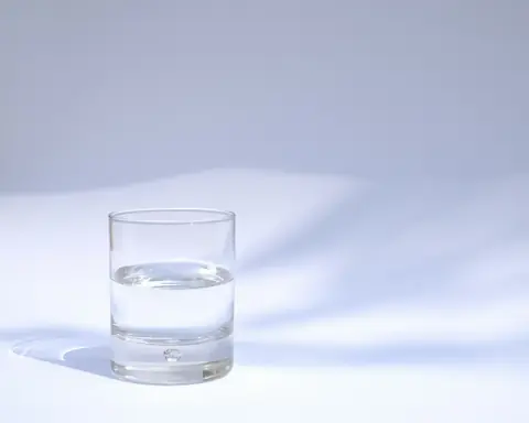 A clear glass of water in soft daylight